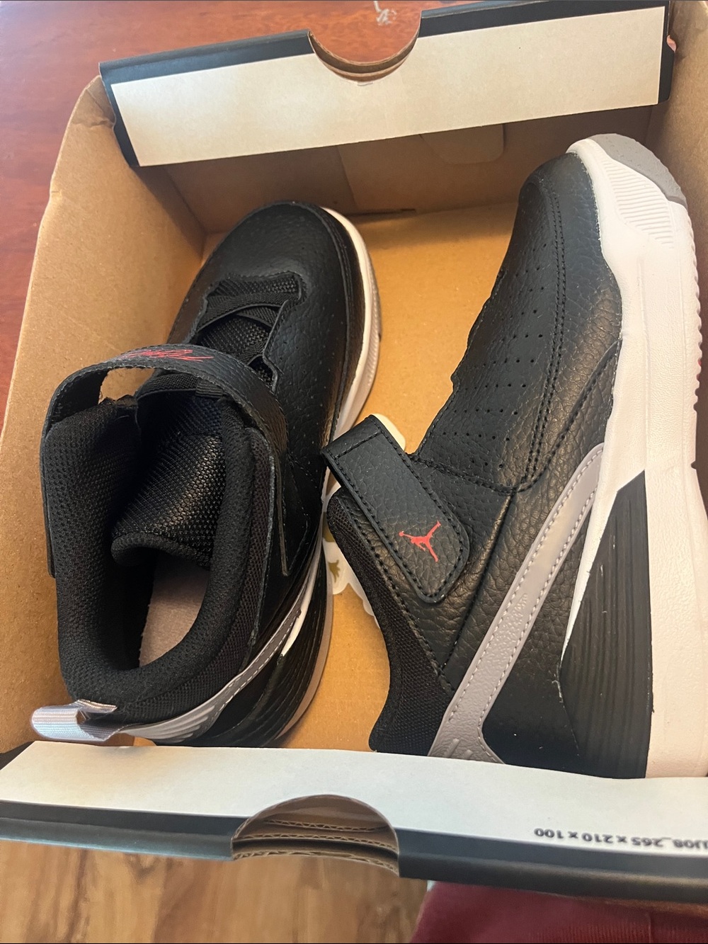 Jordan Kids Black Sneakers with Gray Soles and Red Jumpman